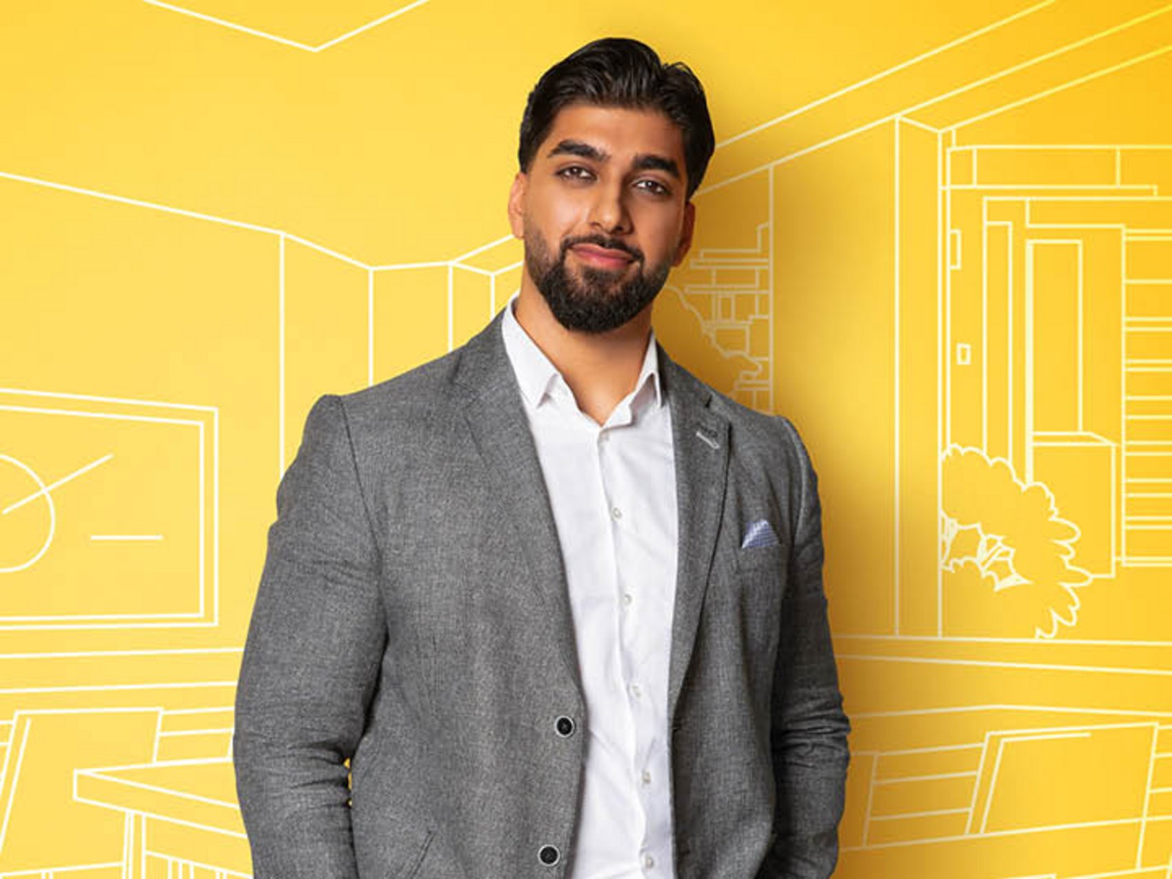 Männliche Person hinter einem gelben Hintergrund